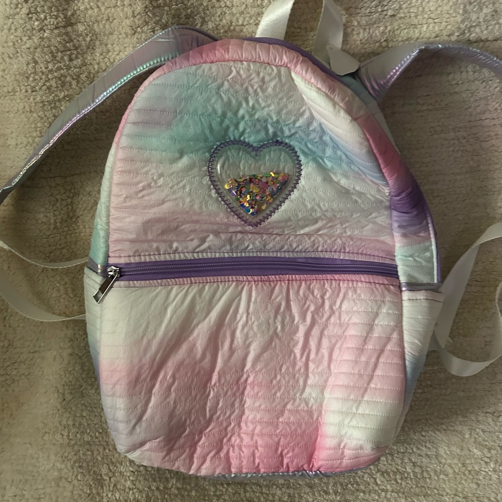 Backpack for a little cutie. New, multicolor with heart on front.